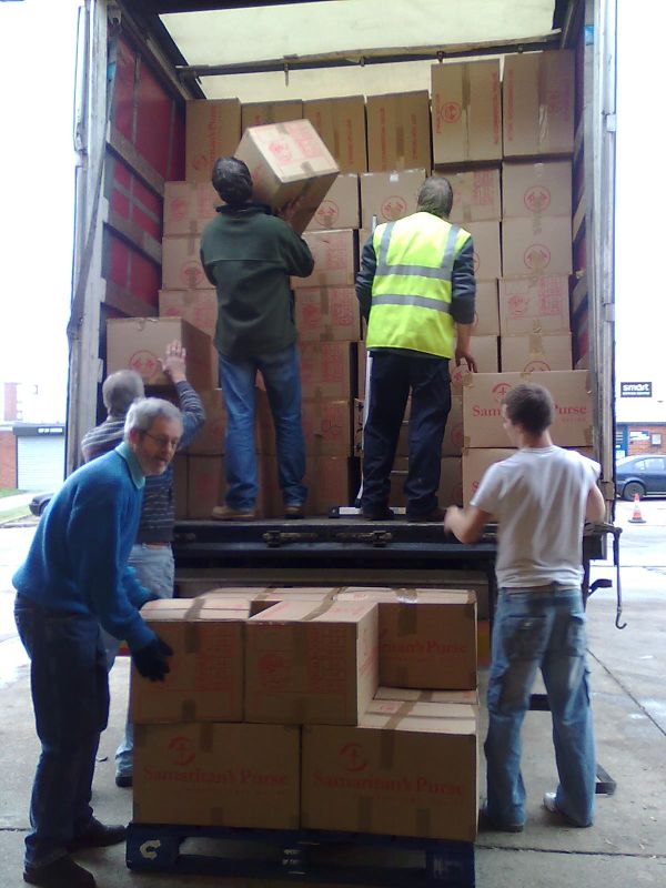 Loading the lorry with shoeboxes
